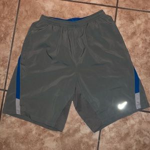 Nike small men’s gray dri-fit running shorts.